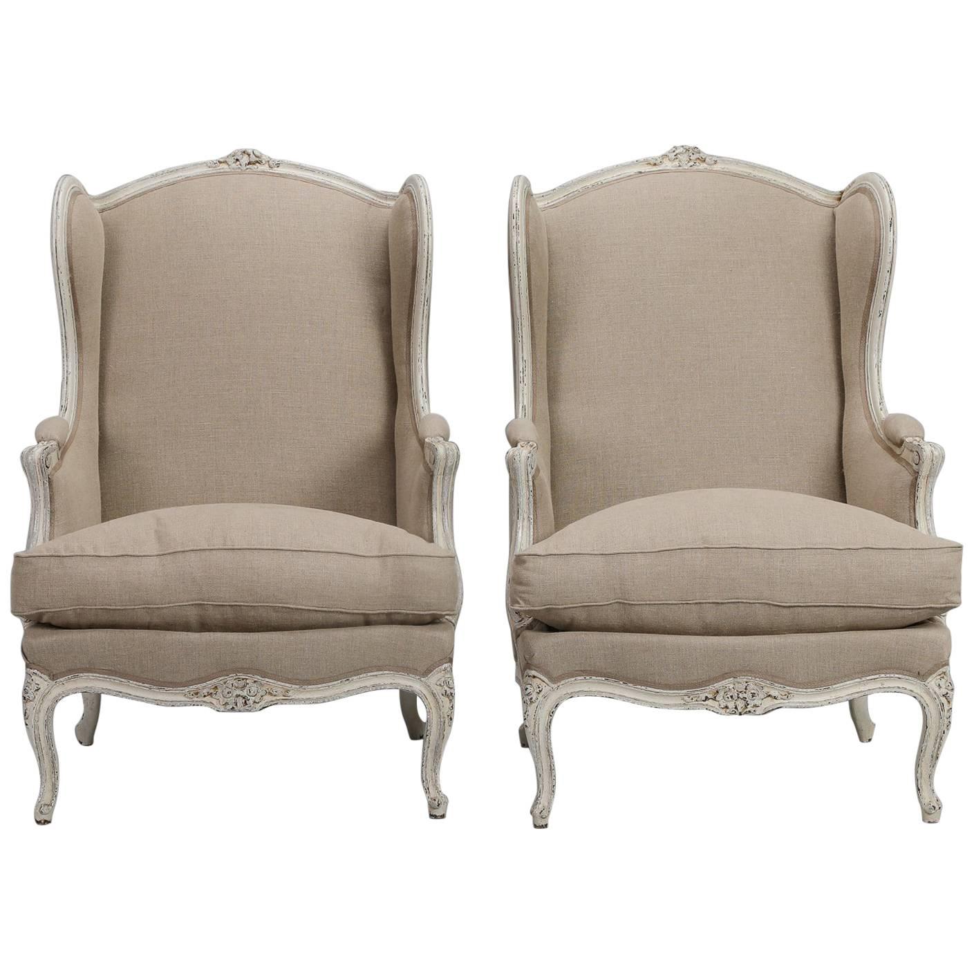 Pair of Linen Covered High Back Bergeres
