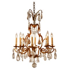 Cut Crystal and Gilded Wrought Iron Chandelier in Attributed to Baguès
