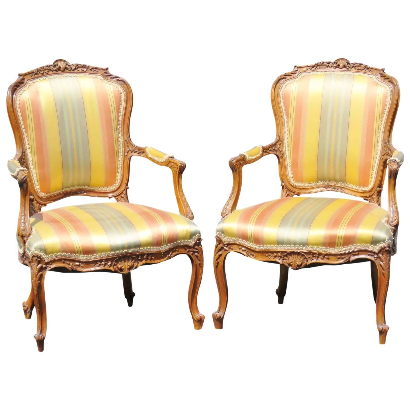 Pair of Louis XVI Style Carved Walnut Fauteuils Arm Chairs