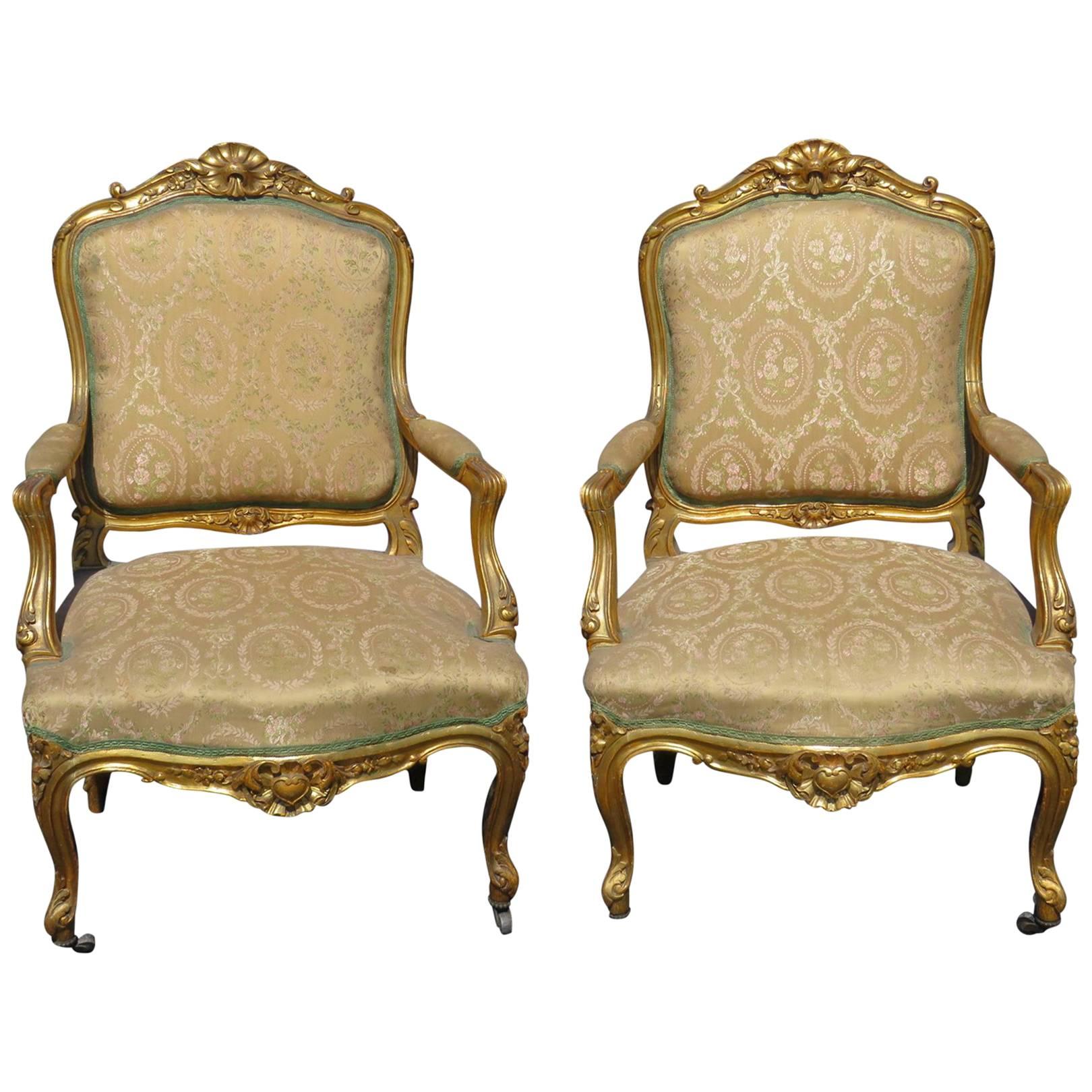 Pair of Louis XVI Style Gilt Carved Upholstered Fauteuils