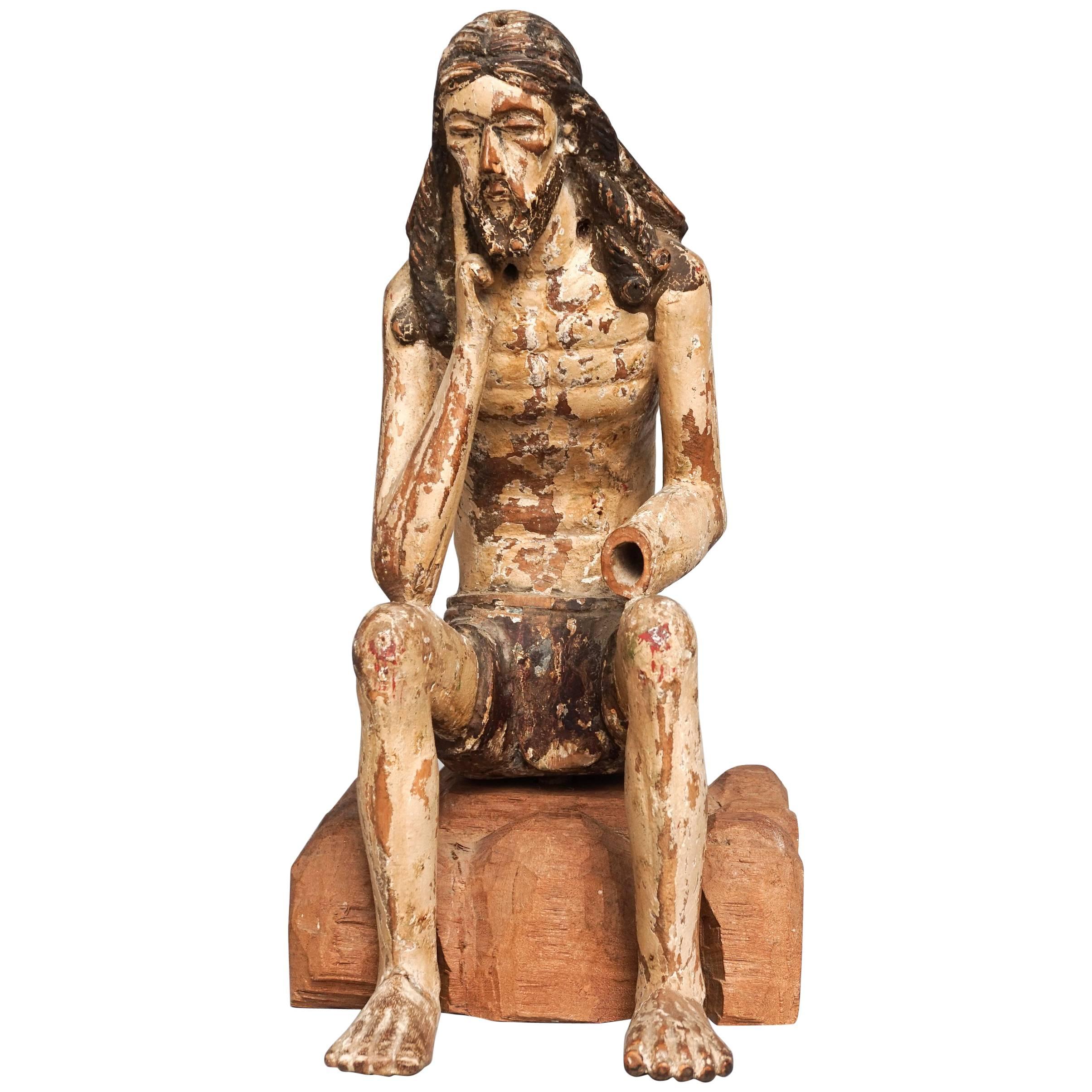 19th Century Carved Fruitwood Sitting Martyr Figure, Christ on a Rock