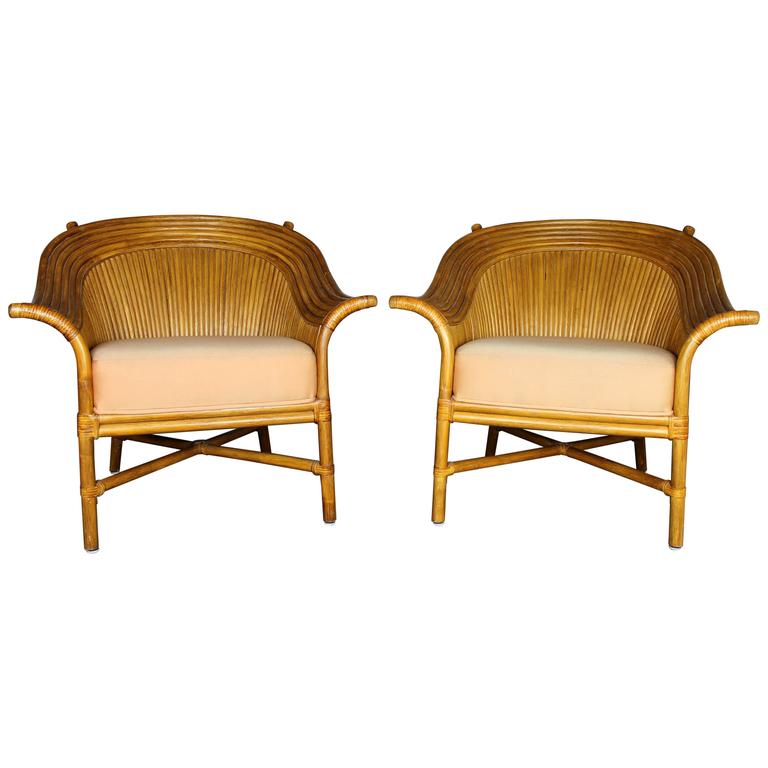 Pair Of Rattan Club Chairs With Fan Backs Vintage In The Style Pair Of Rattan Club Chairs With Fan Backs Vintage In The Style Mcguire For