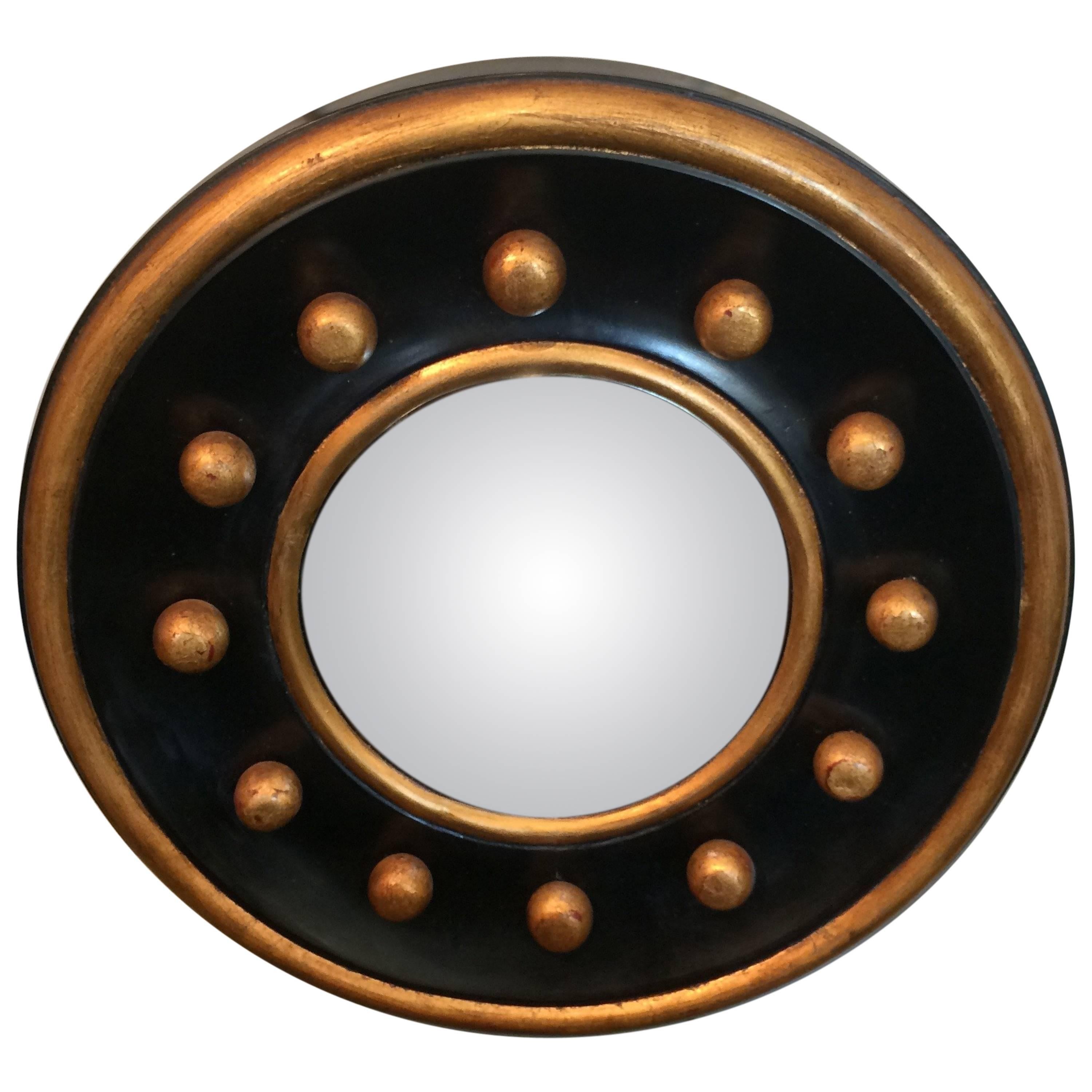 Bold Circular Little Black and Gold Mirror
