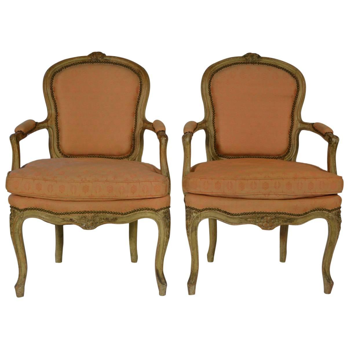 Pair of Louis XV Carved and Crème Peinte Fauteuils