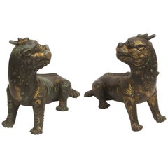 Pair of Antique Chinese Patinated Bronze Fu Lions