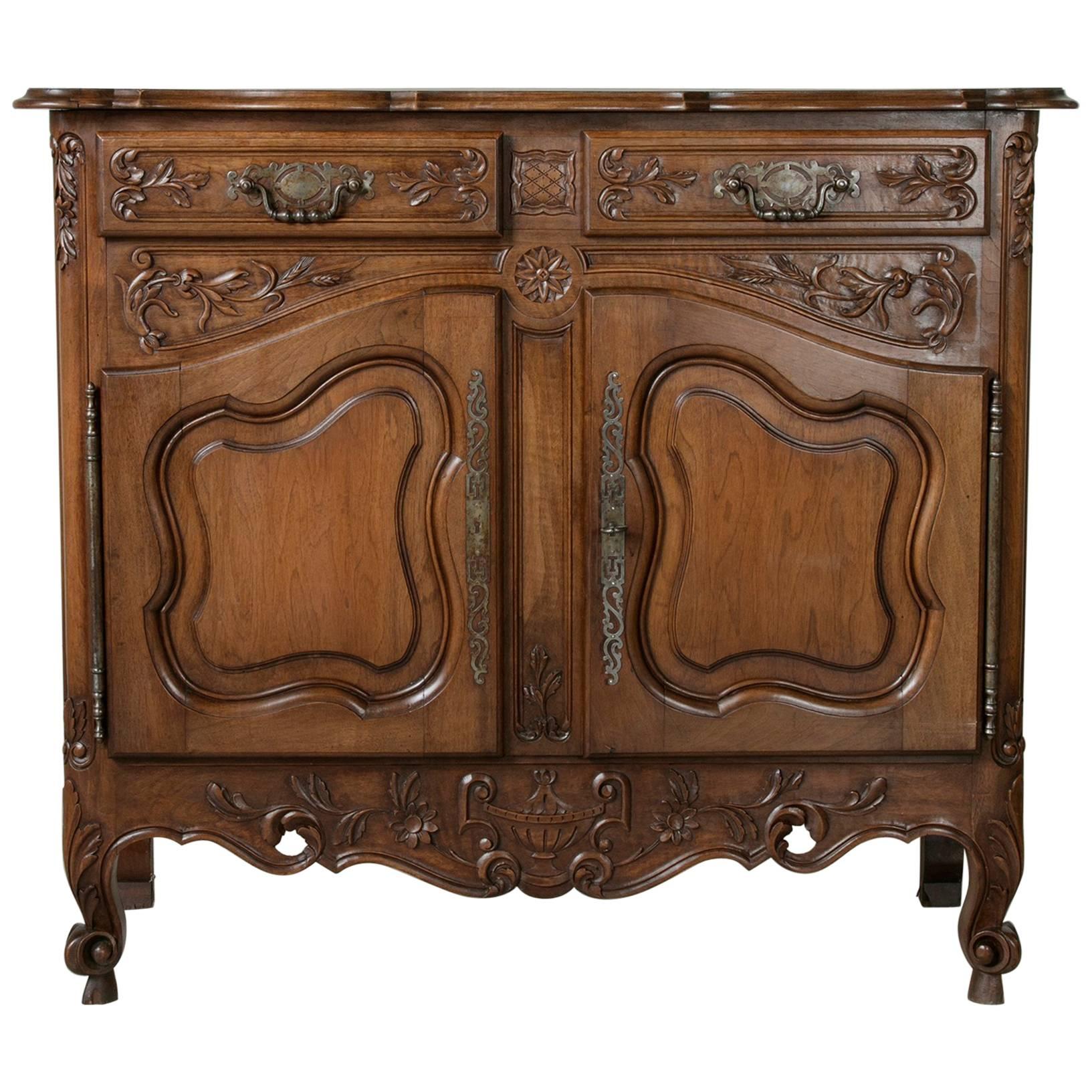 Early 20th Century Louis XV Style Hand Carved French Walnut Buffet from Provence
