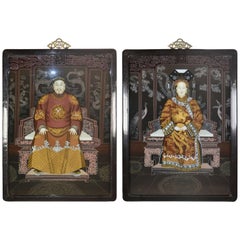 Pair of Chinese Reverse-Painted Glass Portraits