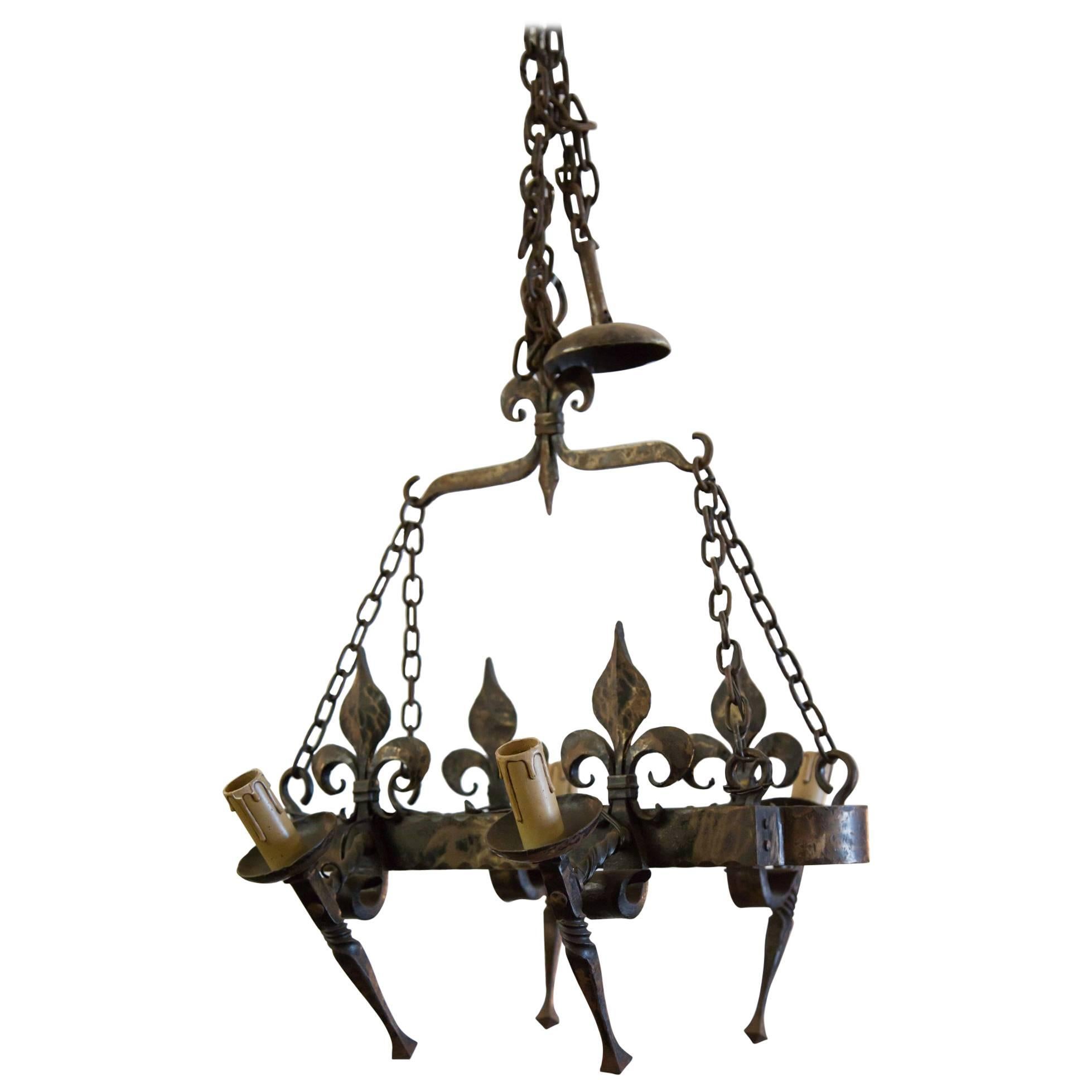 Country French Four Light Hand-Forged Iron Fleur de Lis Chandelier