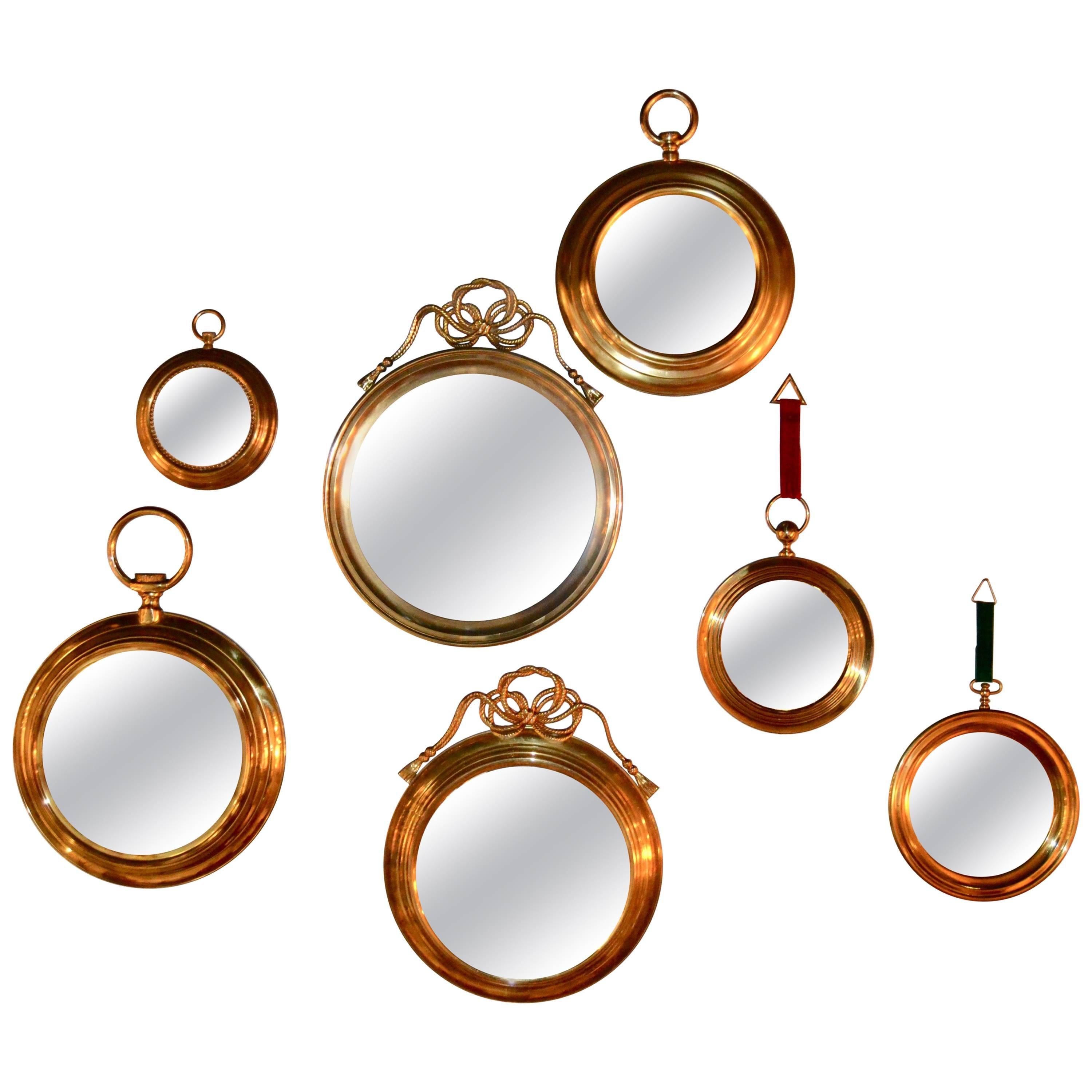 1970s Set of Seven Brass Round Mirrors