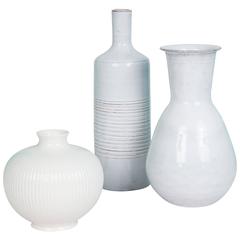 Set of Three White/Off-White Continental Ceramic Vases