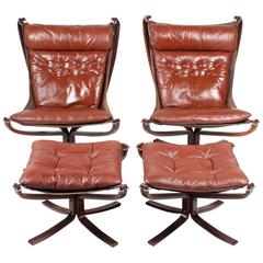 Pair of Falcon Chairs with and Ottomans in Leather 1