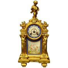 Outstanding Gilt Bronze Clock with Sevres Panels "P. Famourey"