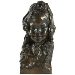 Magnifique bronze de J. Ortis représentant le buste d'une petite fille