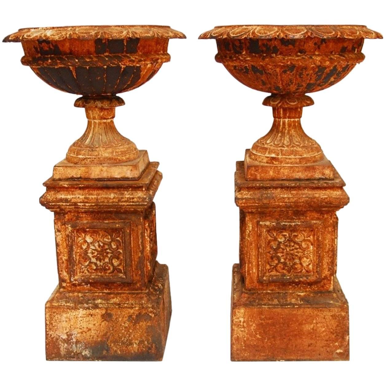 Pair of French Cast Iron Garden Urns on Plinths
