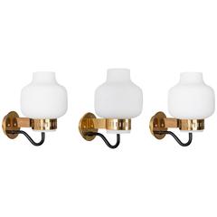Set of Three Stilnovo '2030' Brass and Glass Sconces, circa 1965 7