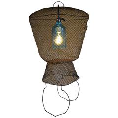 Used Pendant Light from Seltzer Bottle Suspended in French, Steel Mesh Fish Basket