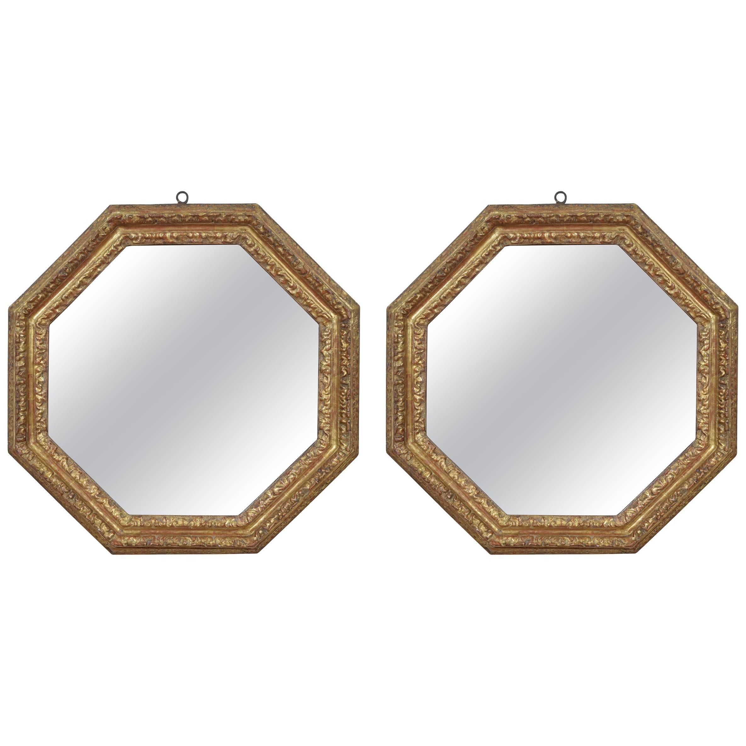 Pair of Italian Carved Giltwood Octagonal Mirrors, Late 17th-Early 18th Century