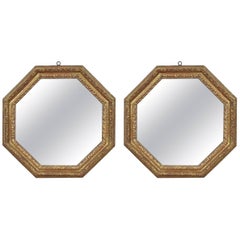 Pair of Italian Carved Giltwood Octagonal Mirrors, Late 17th-Early 18th Century