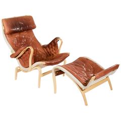'Pernilla' Leather Easy Chair and Footstool by Bruno Mathsson