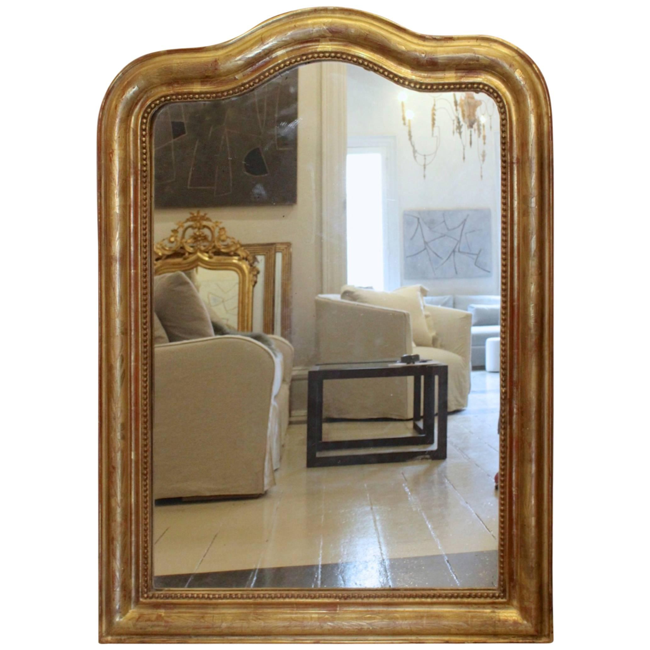 Antique French 19th Century Gilded Louis Philippe Mirror with Rare Curved Top For Sale