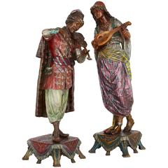 Paire de figures de musiciens orientalistes en bronze peint à froid