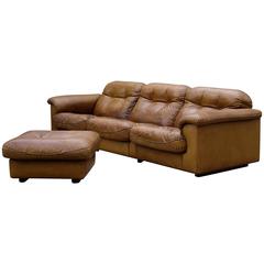 Cognac Leather DS101 Three-Seat Sofa and Ottoman by De Sede, Switzerland