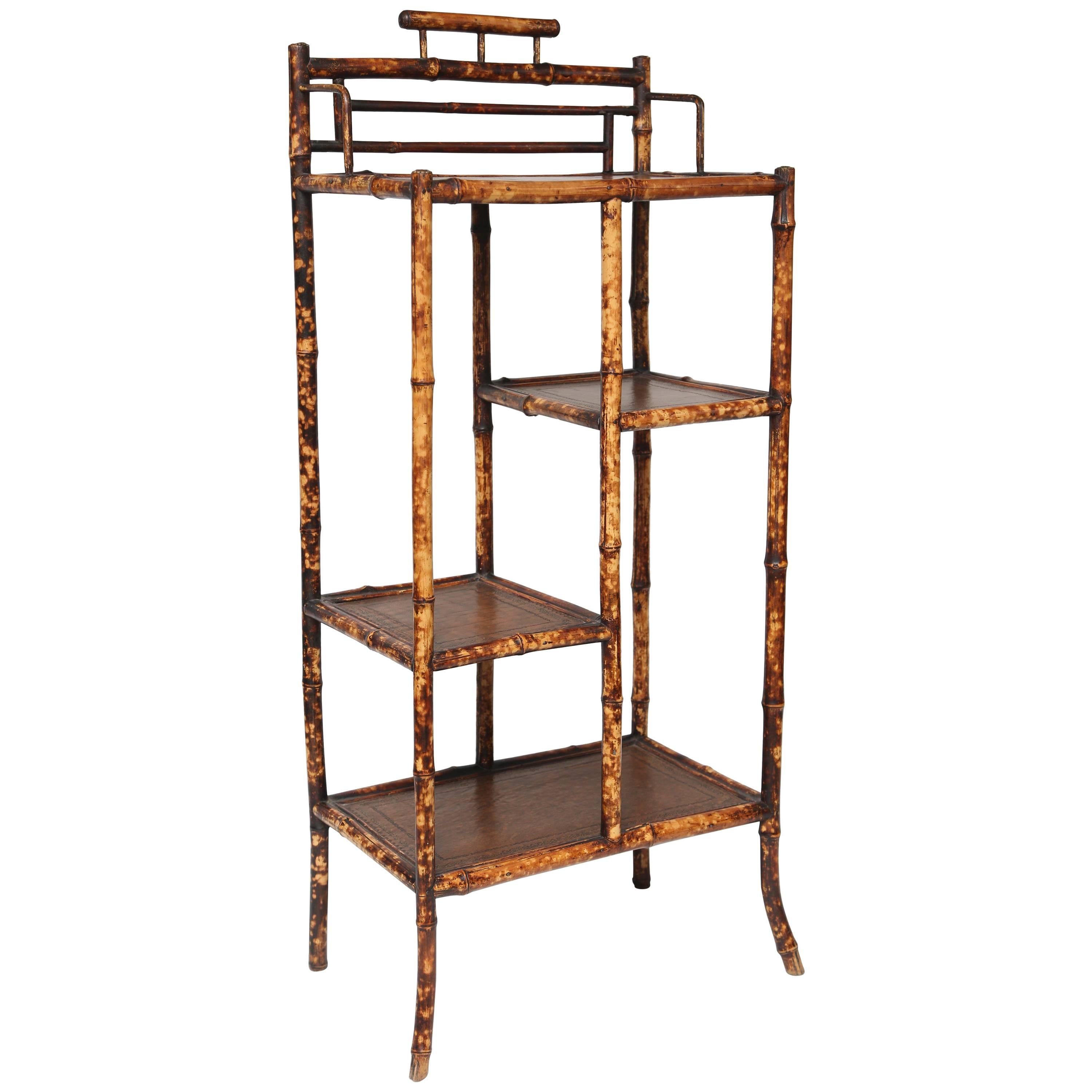 Superb 19th Century English Bamboo Etagere with Leather Tops