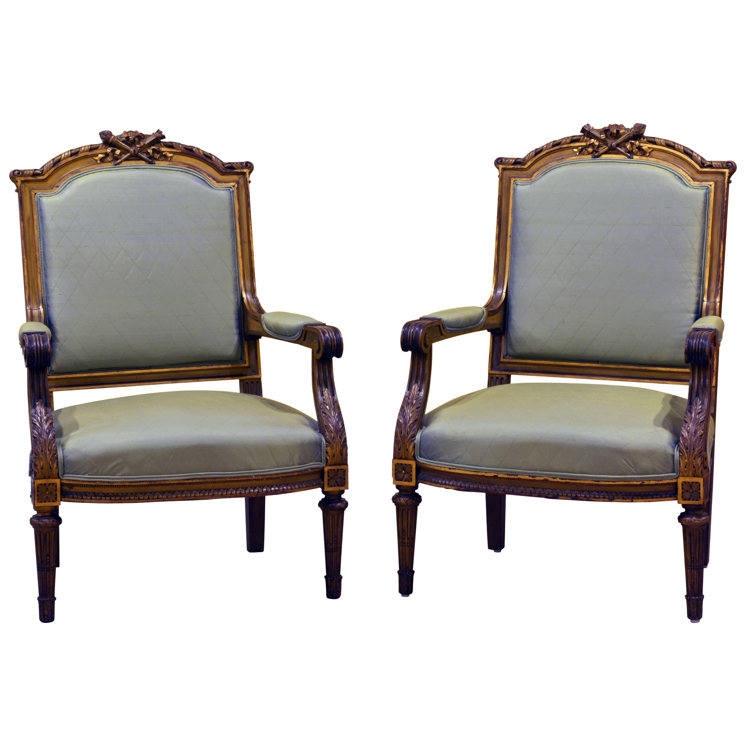 Pair of French, Louis XVI Style Carved and Parcel-Gilt Satin Covered Armchairs