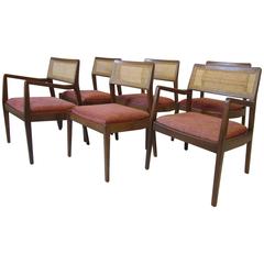 Six Jens Risom Walnut and Caned Upholstered Dining Chairs