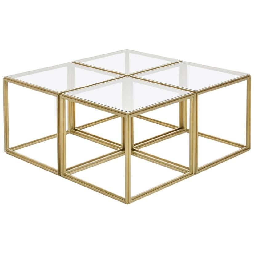 Cubist Set of Four Brass Low Tables and Transparent Glass Tops, by P. Tendercool For Sale