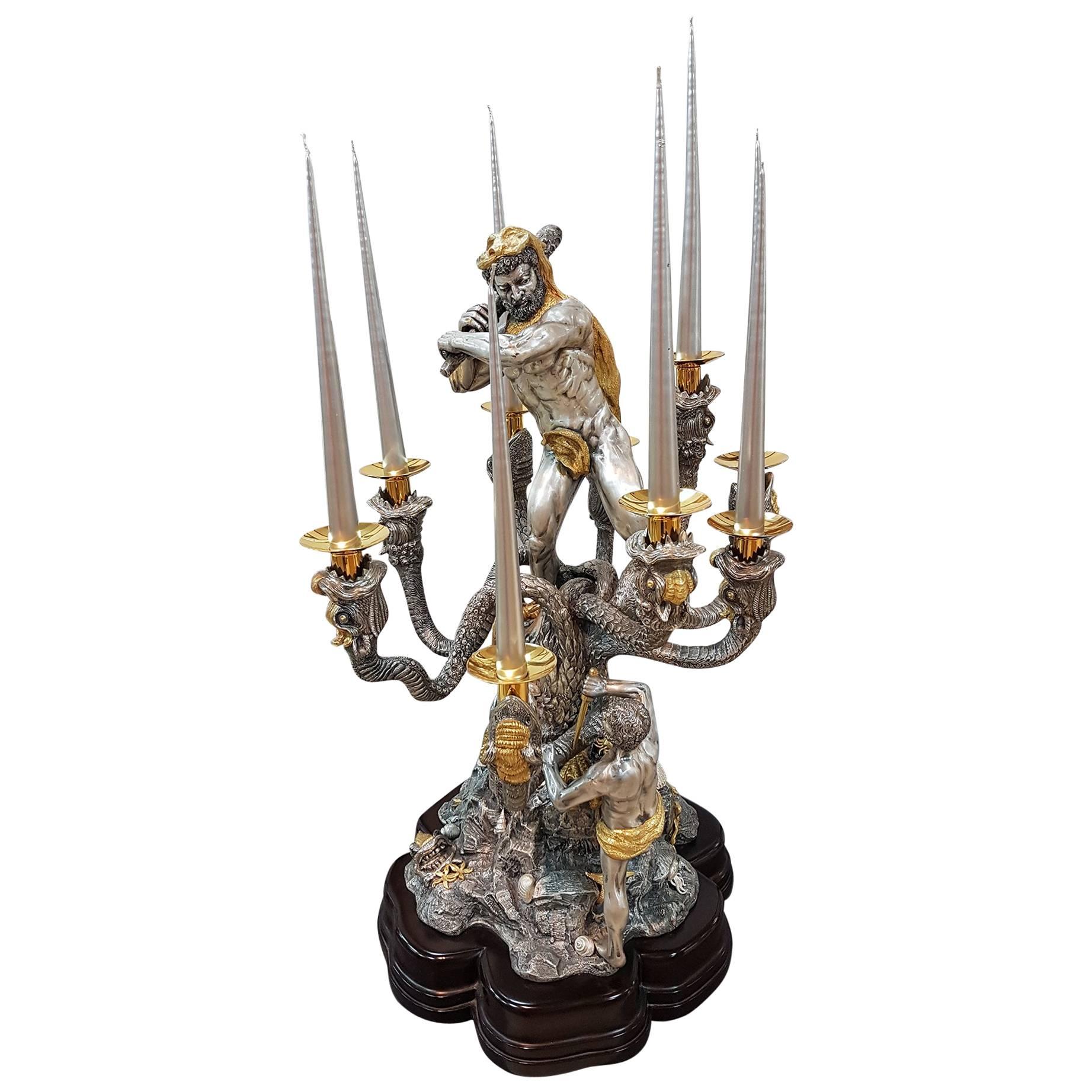 Silver 800 candelabra.
The nine-light candelabra represents Hercules to fight the Hydra.
Completely handmade in casting and chisel.
By ARGENTERIE DI MILANO - Fiorentini à Milan - Italy
Wooden base
17,800 grams of 800 silver

This item was exhibited