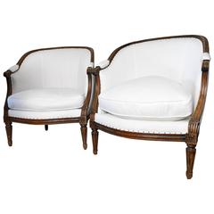 19th Century French Walnut Bergeres with Muslin Upholstery and Down Cushions
