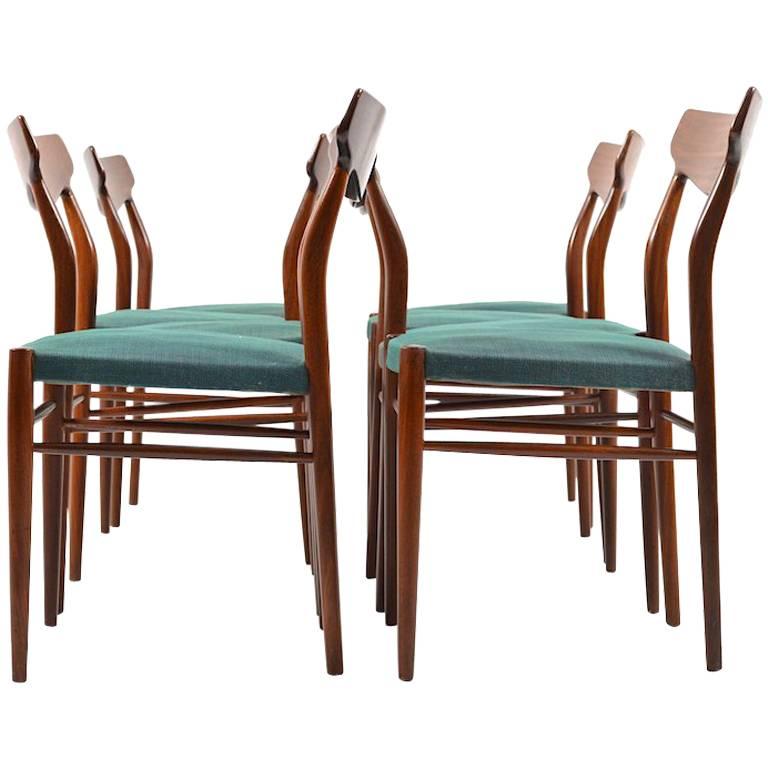 Set of Ten Mid-Century Teak Dining Chairs by Luebke For Sale