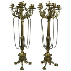 Pair of Antique Figural Bronze Five-Light Column Candelabra, Winged Lion Design