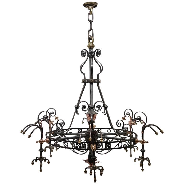 Enormous Arts and Crafts Brass and Iron Chandelier from St