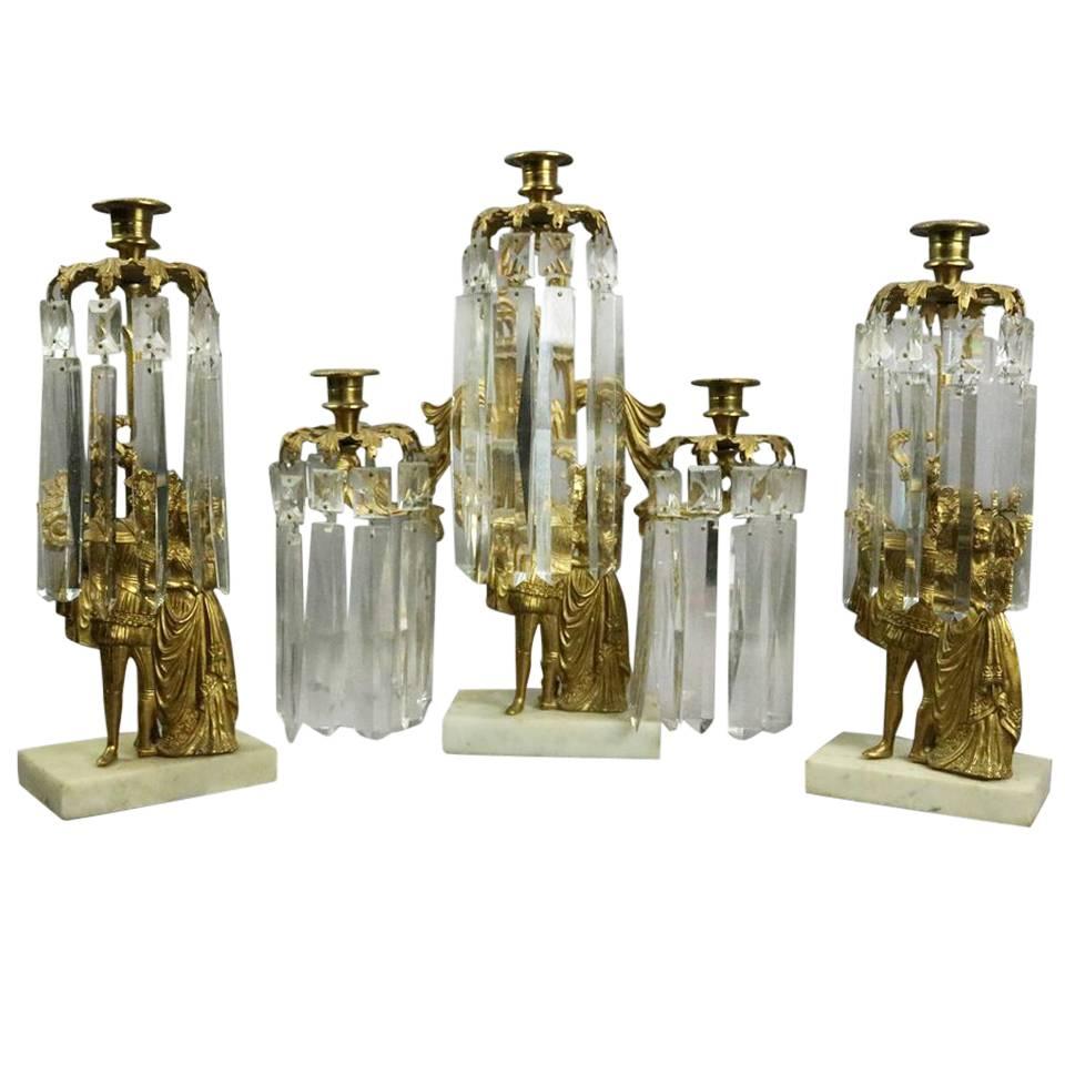 Set of Three Antique French Classical Gilt Metal and Crystal Figural Girandoles