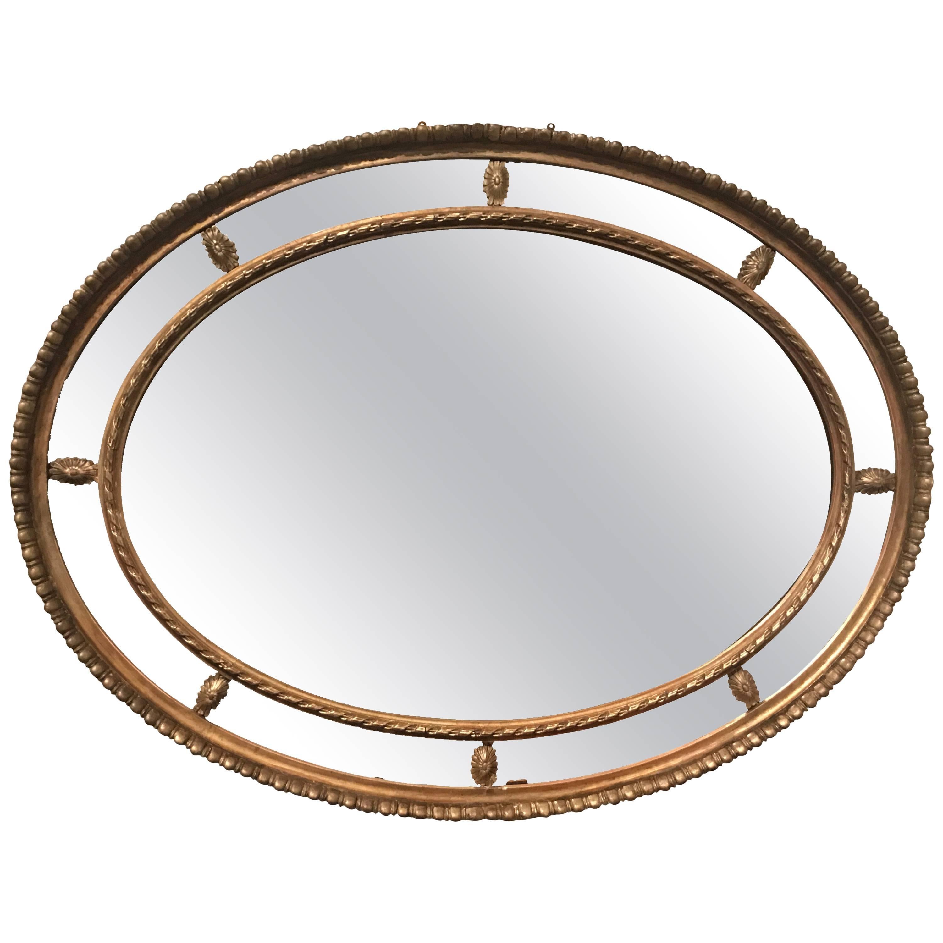 Early 20th Century Oval Segmented Gilt Mirror