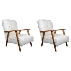 Pair of armchairs in goatskin at cost price