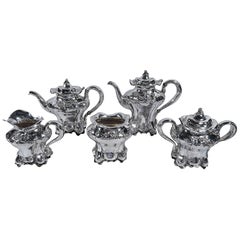 American Art Nouveau Hand-Hammered Coffee and Tea Set with Flowers