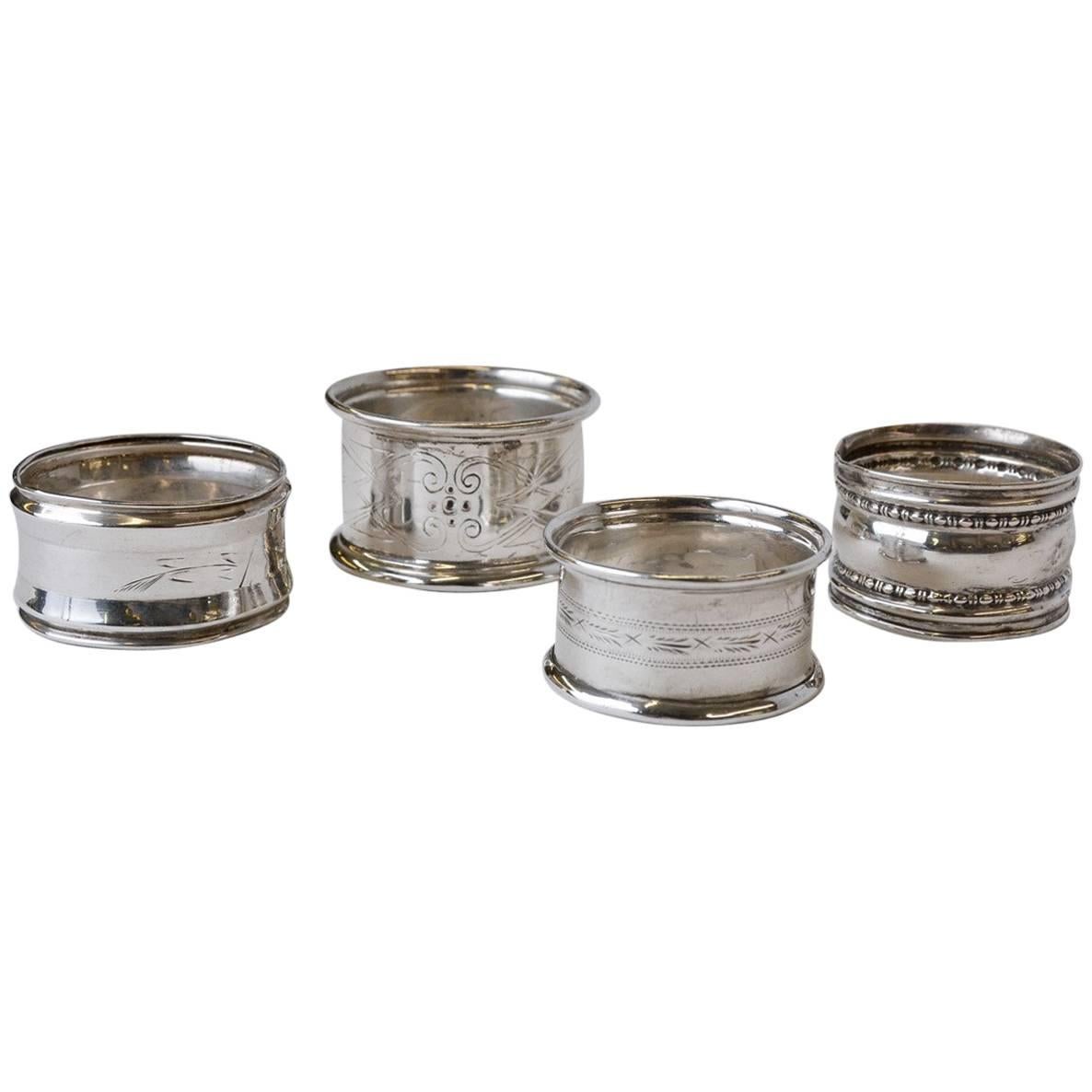 Collection of Four English Antique Silver Napkin Rings