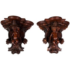 Pair of Applied Consoles in Carved Walnut with Putti Decor, 19th Century