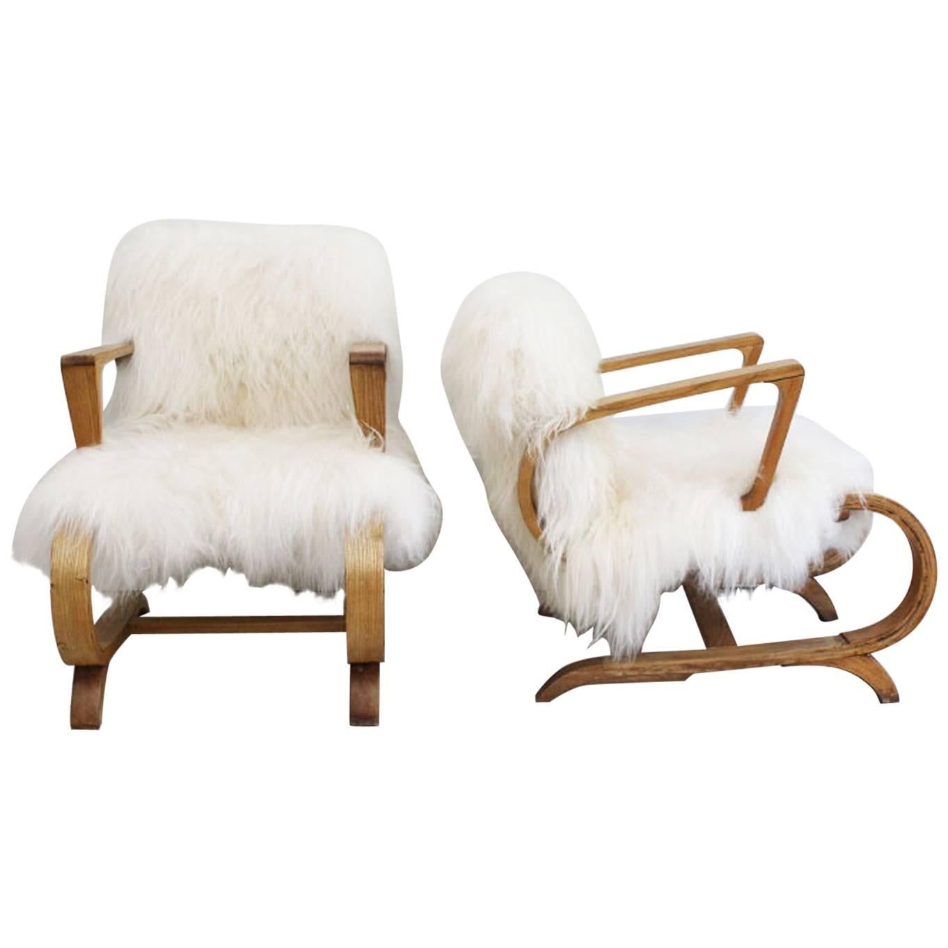 Pair of 1950s Cantilever French Armchairs Covered in Icelandic Sheepskin