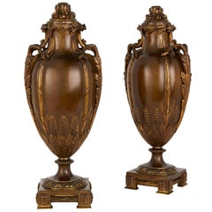 Pair of Gilt and Patinated Bronze Lidded Antique Vases