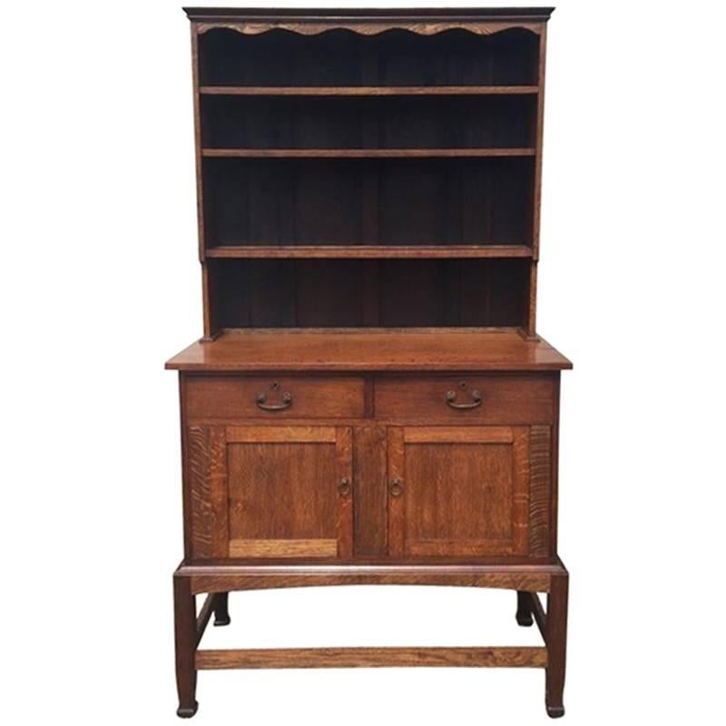 An Arts & Crafts Craftsman made simple Oak Dresser with Decorative Shaped Top  For Sale