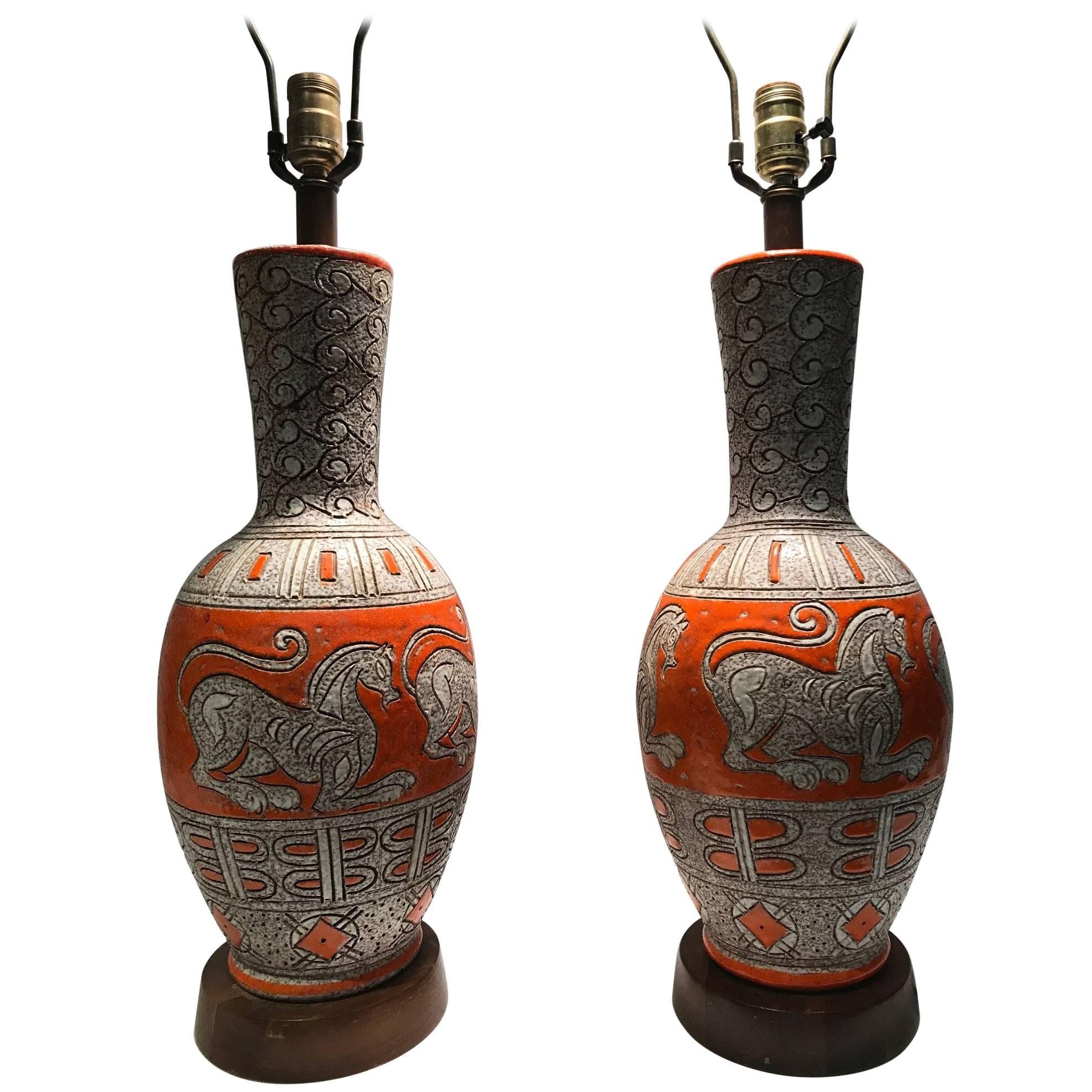 Pair of Mid-Century Italian Orange Glazed Ceramic Lamps with Chimera Decoration
