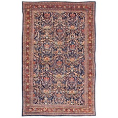 Large Antique Persian Sultanabad Rug in Blue Background in Multi Colors