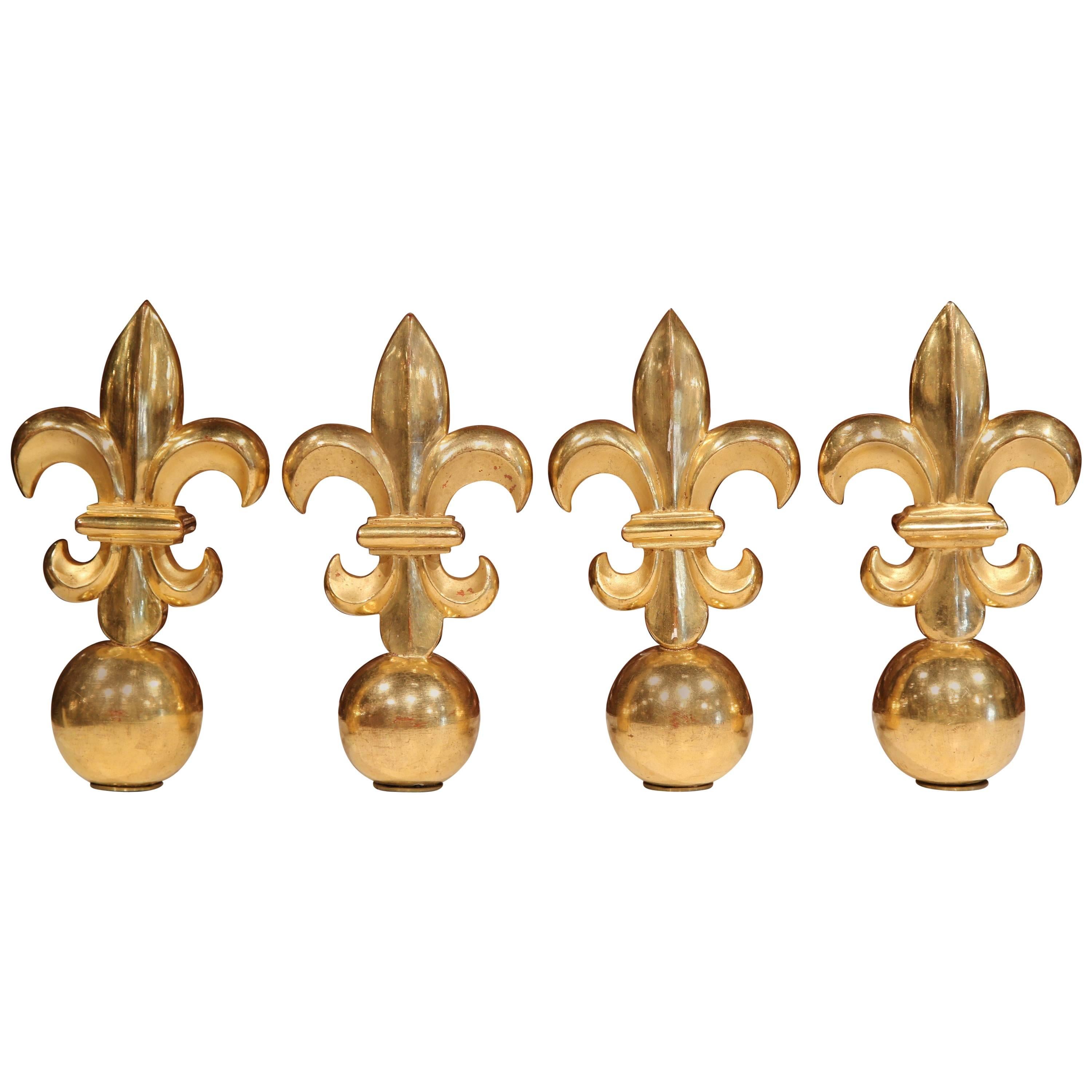 Early 20th Century French Set of Four Carved Giltwood Decorative Fleur-de-Lys