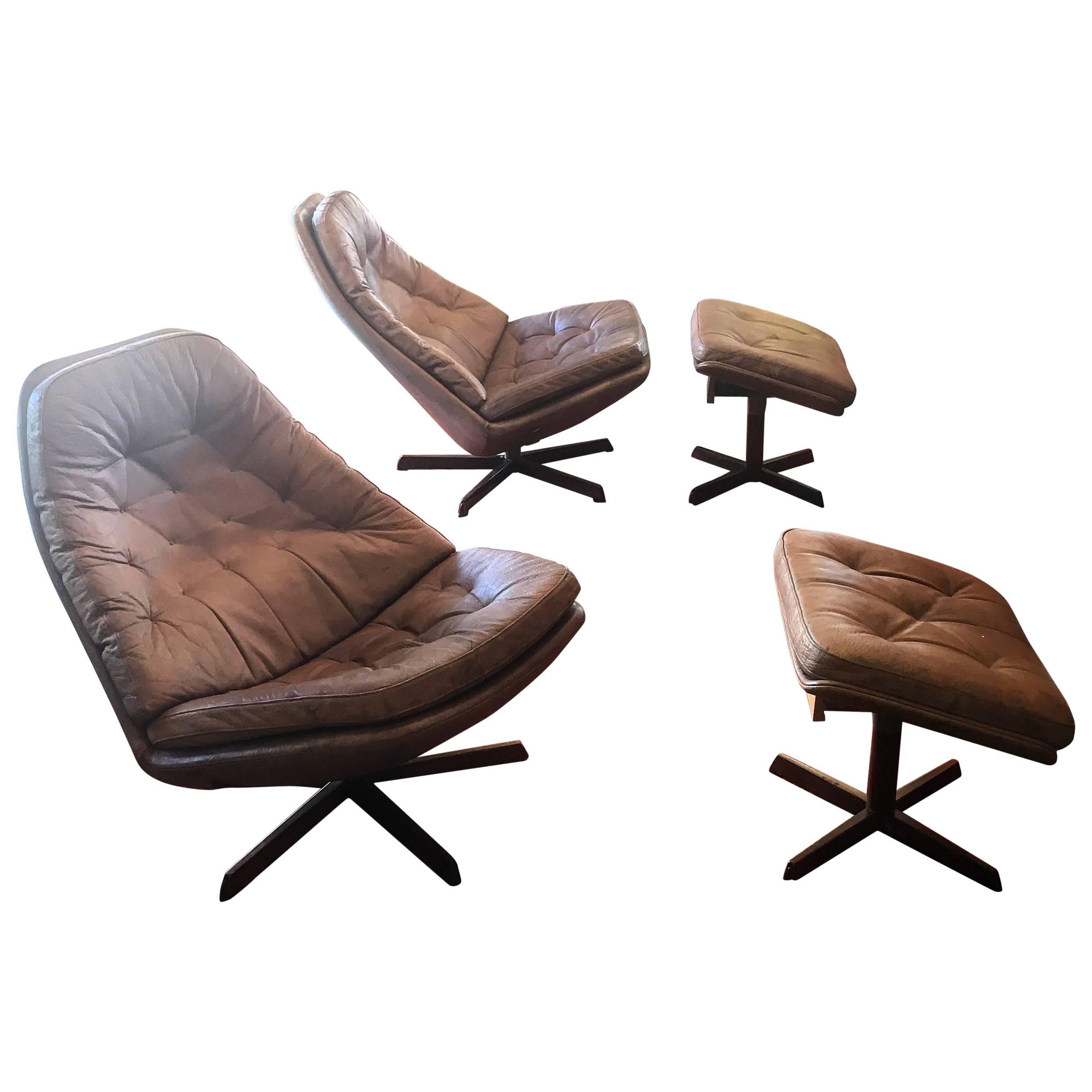 Pair of Leather Lounge Chairs and Ottomans by Madsen and Schuber