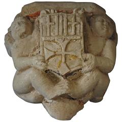 Early Sandstone Wall Mount Sculpture from Spain Depicting Putti's and Crest