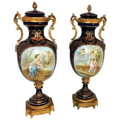 Fine Large Pair French Sevres Cobalt Blue Hand Painted Rimel Bronze Covered Urns